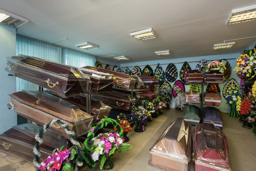 Exhibition room with shelves for coffins